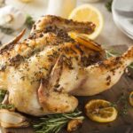 pui la cuptor cu unt, ierburi romate, rozmarin si lamaie